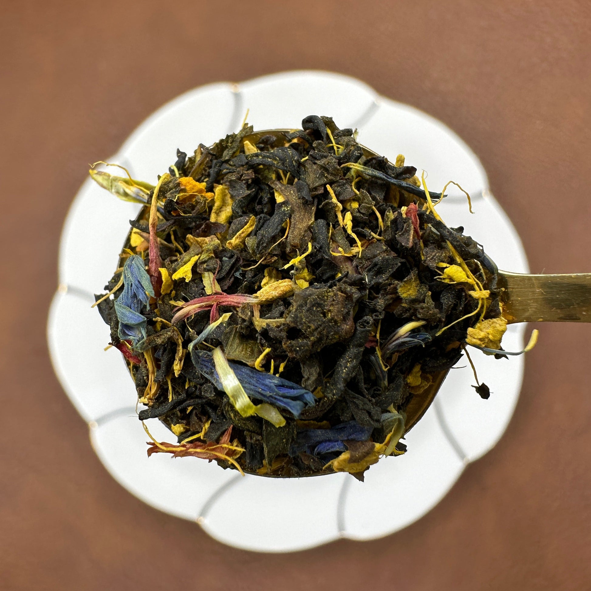 Root Revival, Premium Loose Leaf Tea, Green and Black Loose Leaf Tea, Ginger and Turmeric, Wellness, on Gold Teaspoon